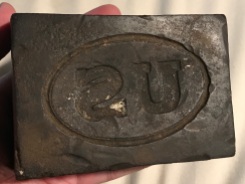 Sometimes you stumble on unique historic pieces in old home renovations. Check out this Union Army belt buckle mold! The iron block mold was hidden among the bricks and weighed about 8lbs.