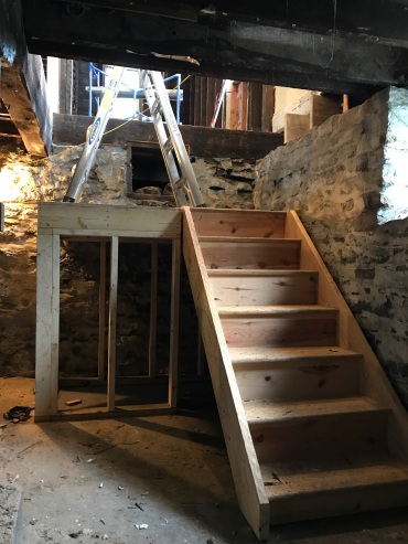 The new switchback staircase for the basement access.